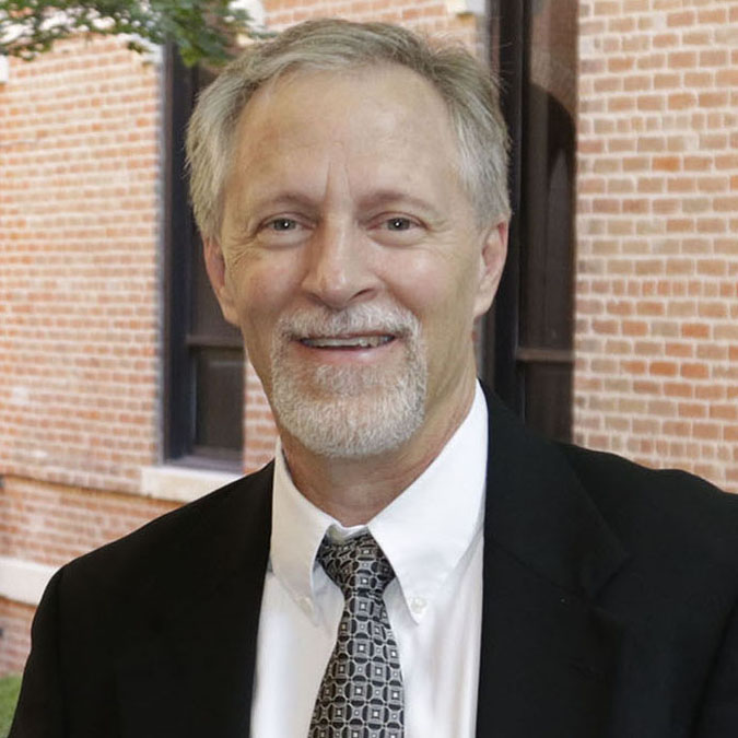 perry glanzer, headshot photo, suit and tie, on Baylor campus in Texas